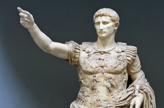 Statue of Augustus of Prima Porta, depicting the first Roman emperor as a divine figure wearing a military costume and standing in a powerful pose.