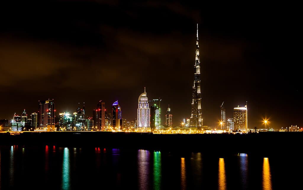 Nighttime view of the Burj Khalifa towering over Dubai