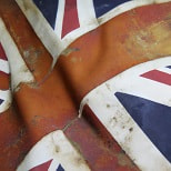 Close-up of weathered and rustic British flag.